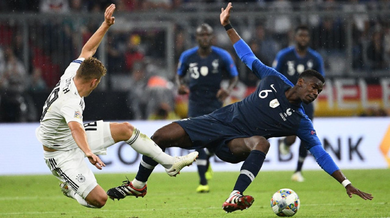 Jozua Kimmihs un Pols Pogba, Foto: AFP / Scanpix