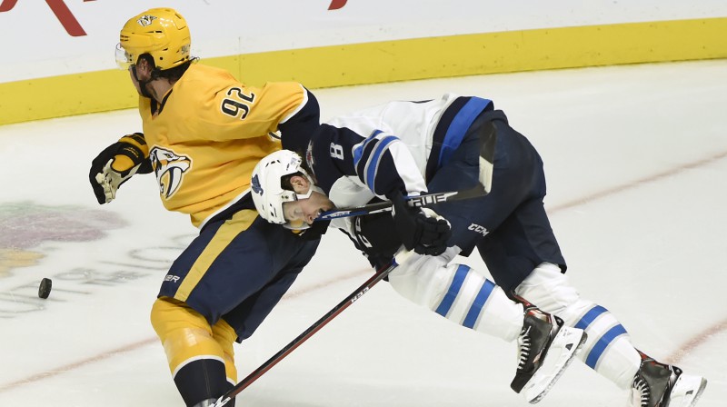 Raiens Džohansens pret Džeikobu Trubu. Foto: AP/Scanpix