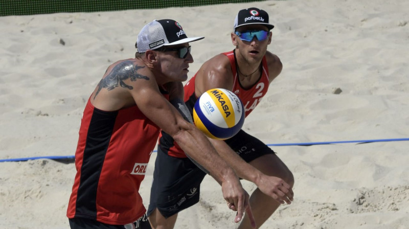 Mārtiņš Pļaviņš un Edgars Točs. Foto: FIVB