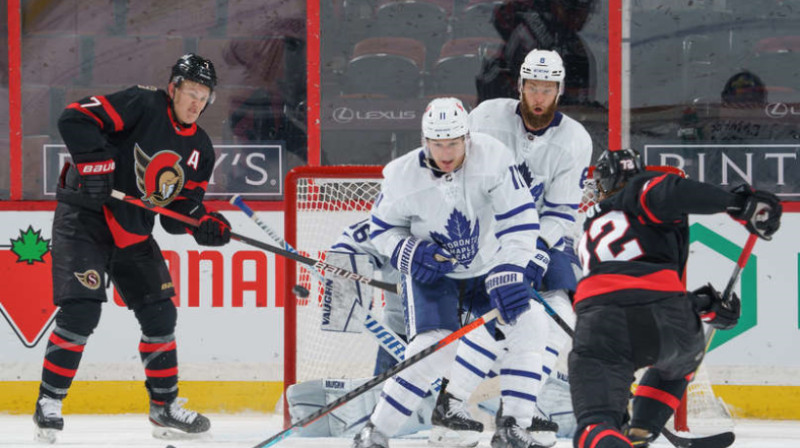 Toronto hokejisti aizsargājas Foto: AFP/Scanpix