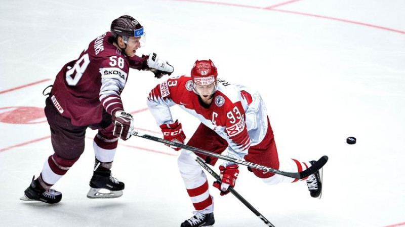 Guntis Galviņš pret Pēteru Reginu. Foto: AFP/Scanpix